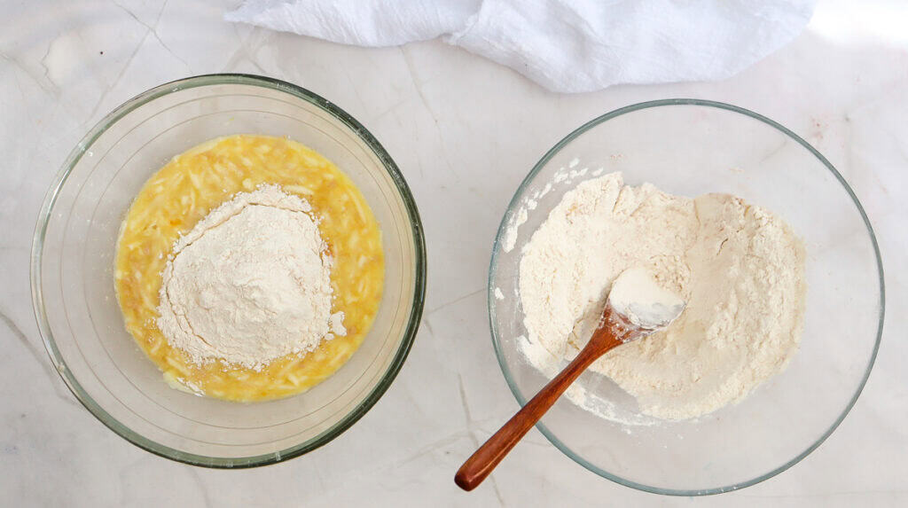 adding dry to wet ingredients for zucchini bread