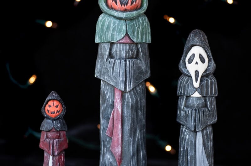 three spooky halloween carvings in robes