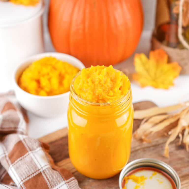 a glass jar of homemade pumpkin puree