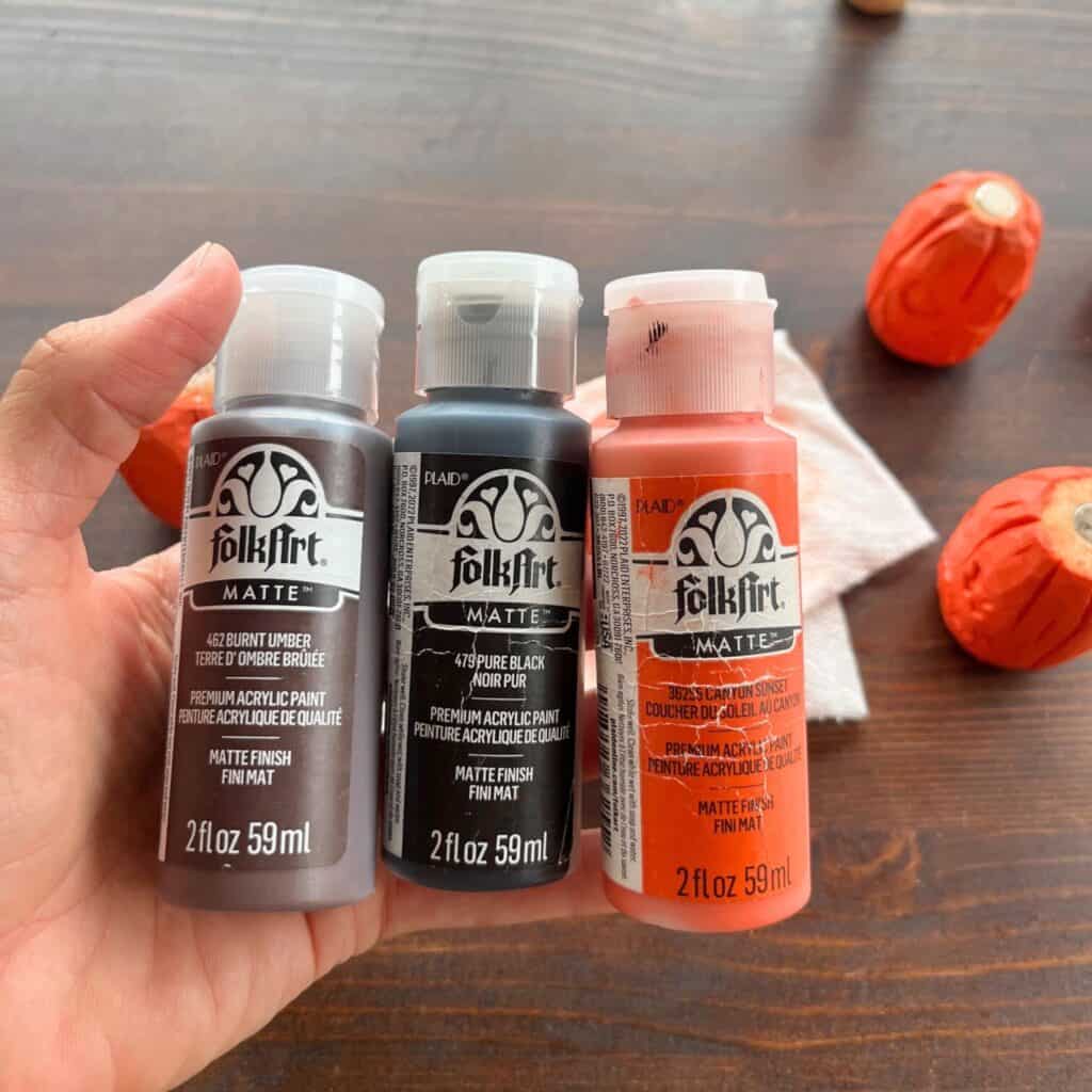 three folk art paints for painting wood carigs