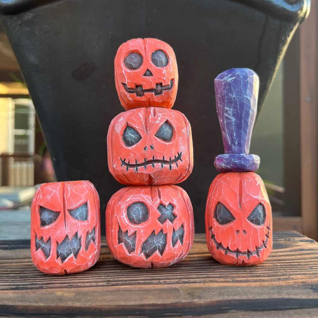 five hand carved wood jack o lanterns