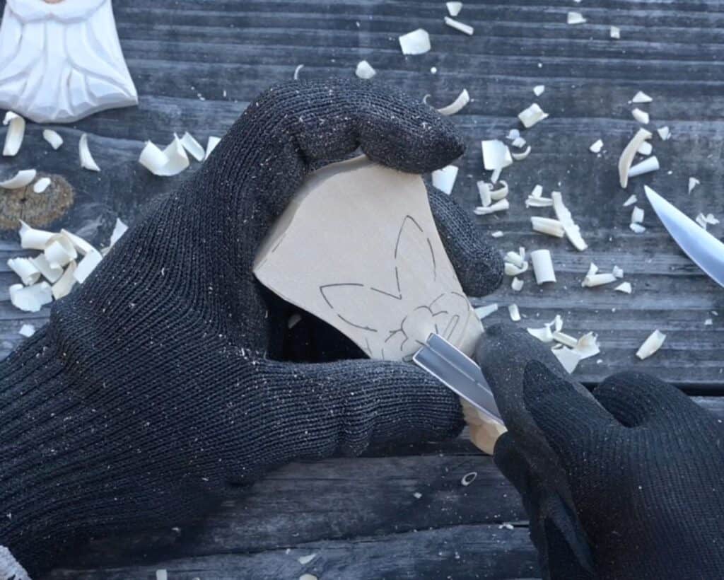 carving the nose of a wodo santa