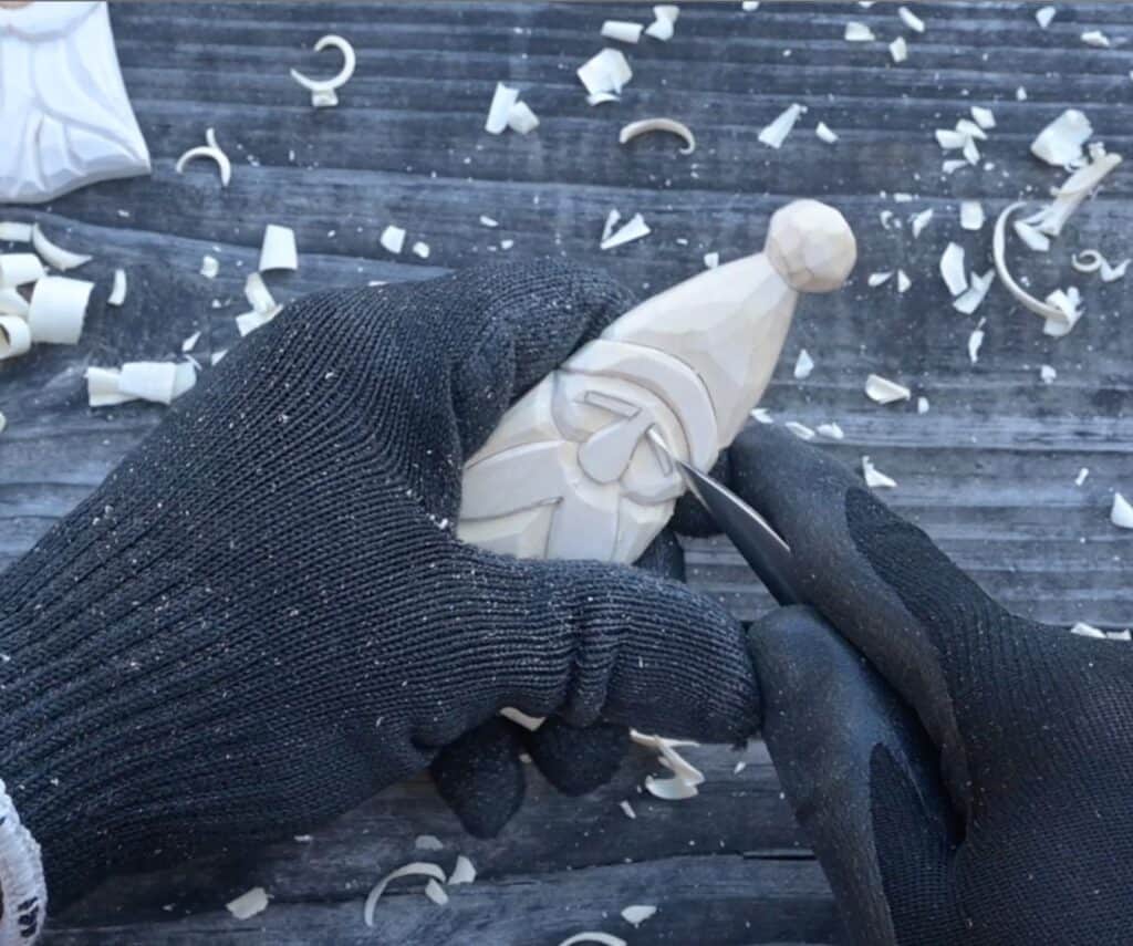 carving the eyebrows of a wodo santa