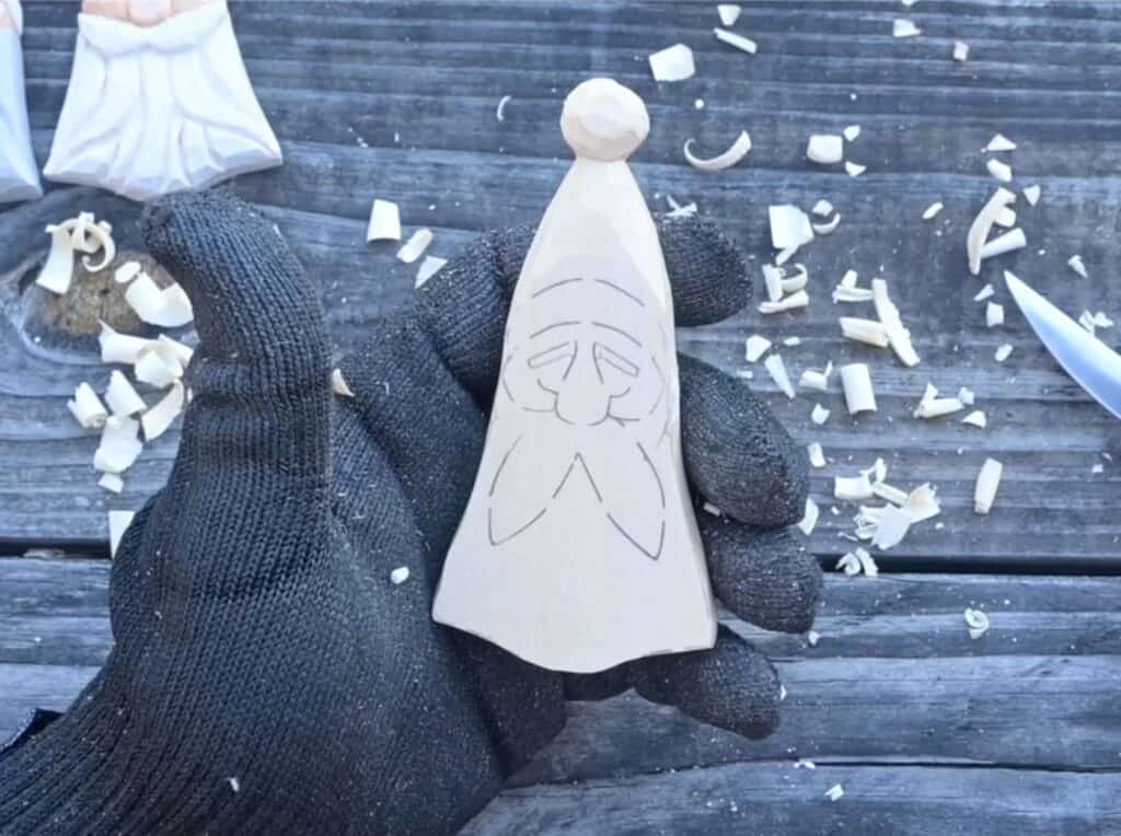 a roughed out santa carving